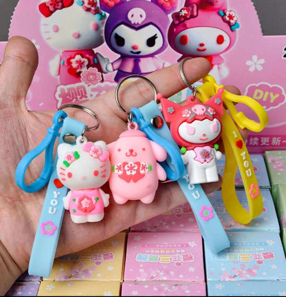 Boite Mystère figurine Sanrio Hello Kitty porte-clé